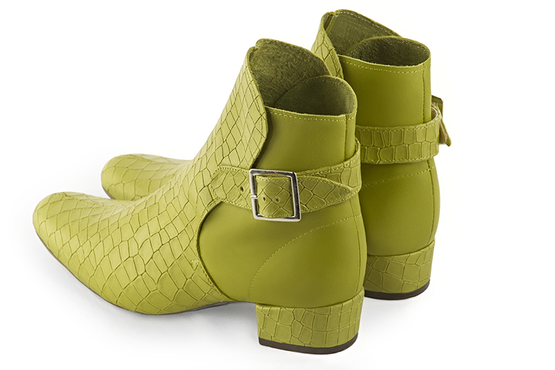 Women's pistachio green elegant ankle boots, with buckles at the back. Round toe. Low block heels - Rear view